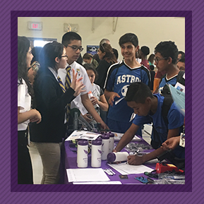 Students gathered around a table